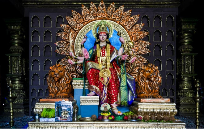India religious deity Durga in a vibrant attire.