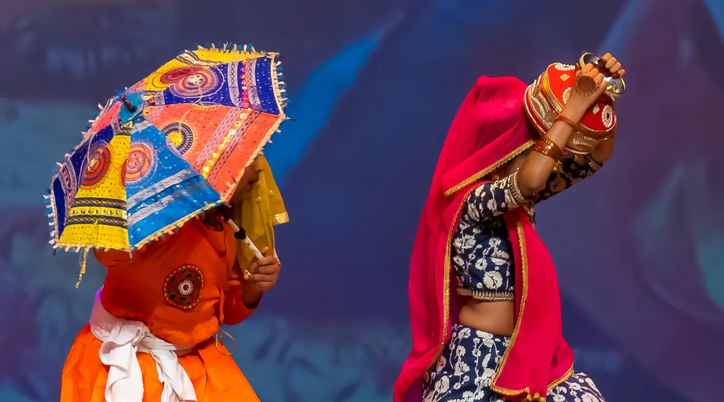 Bhagoria dancers with colorful props
