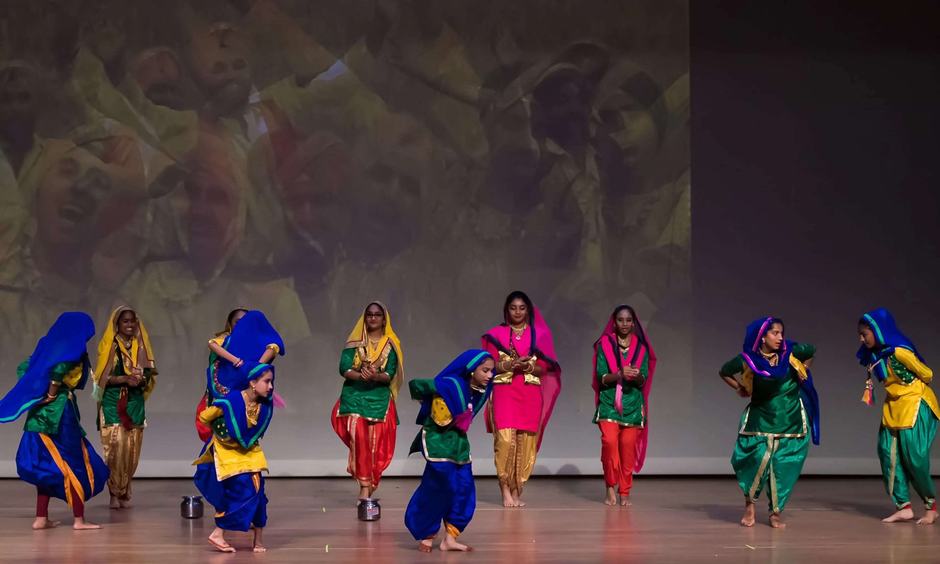 NSDA dancers performing Bhangra on stage