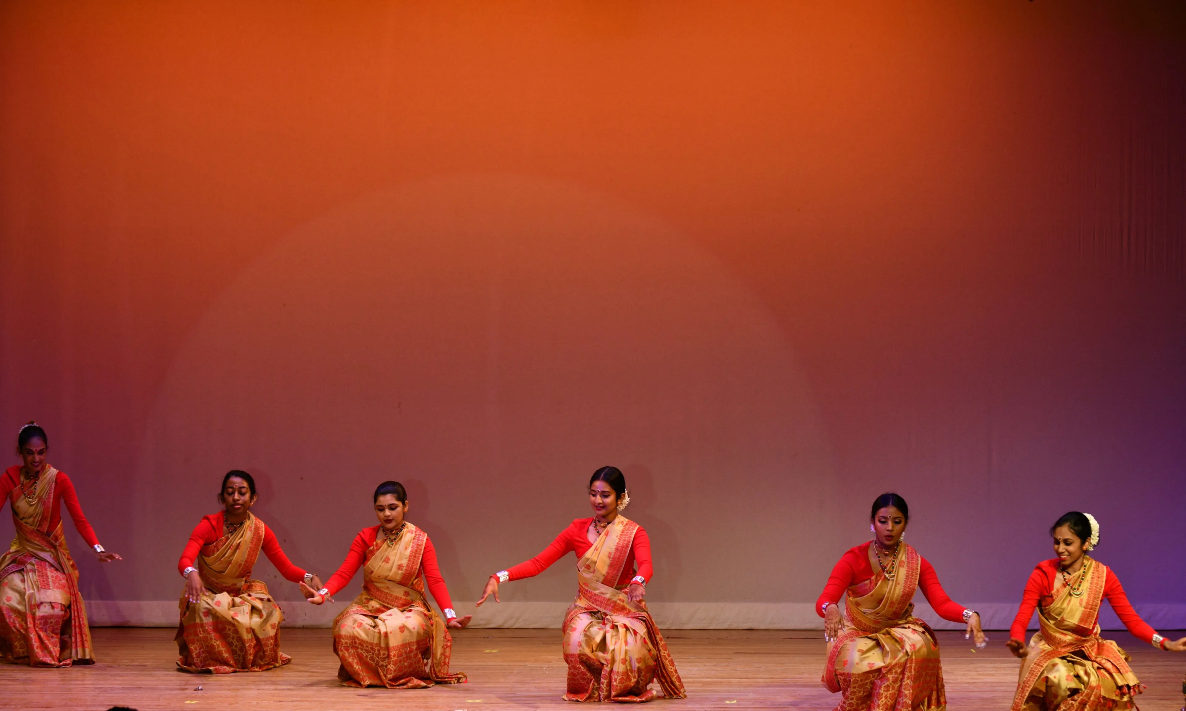 NSDA dancers performing Bihu on stage