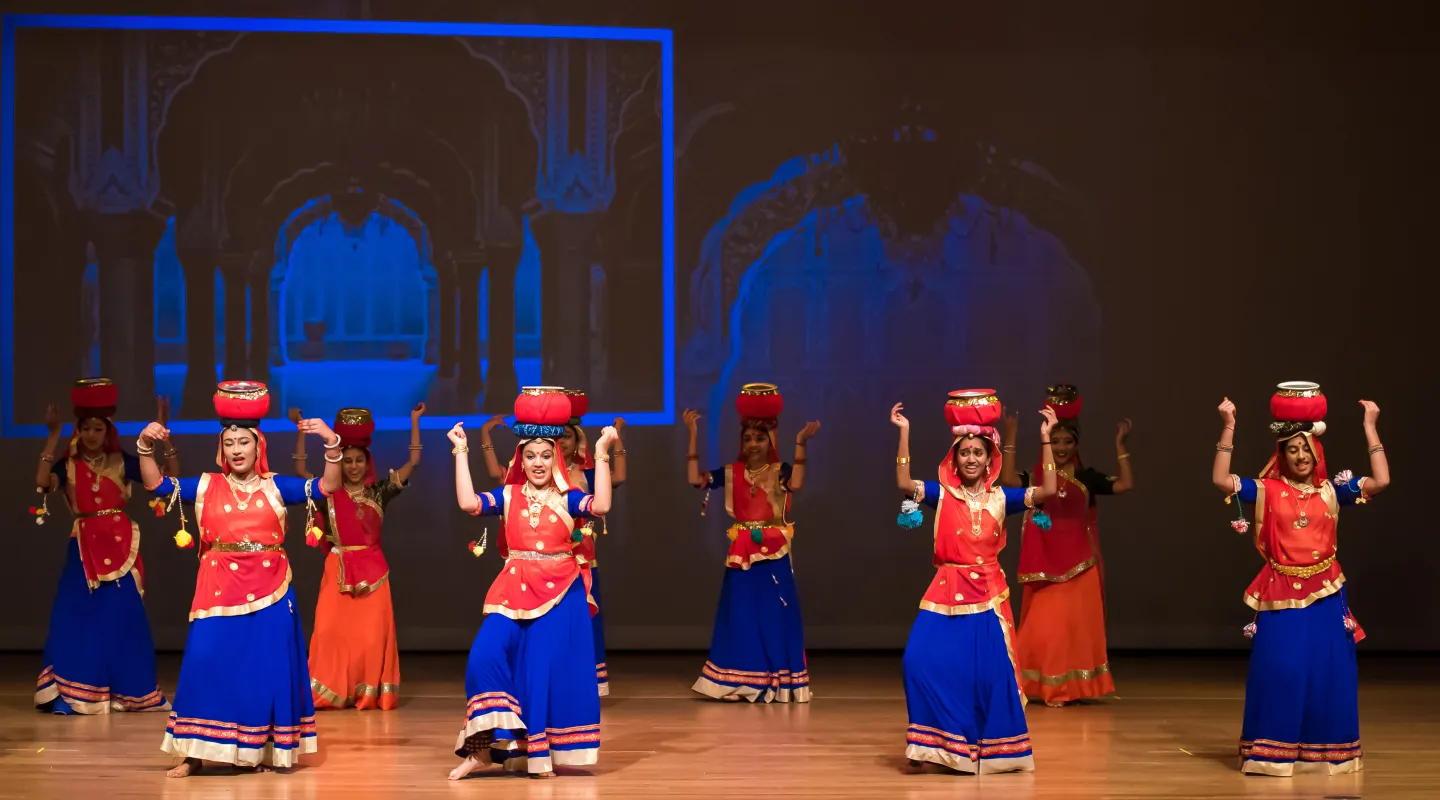 NSDA students performing Chari on stage