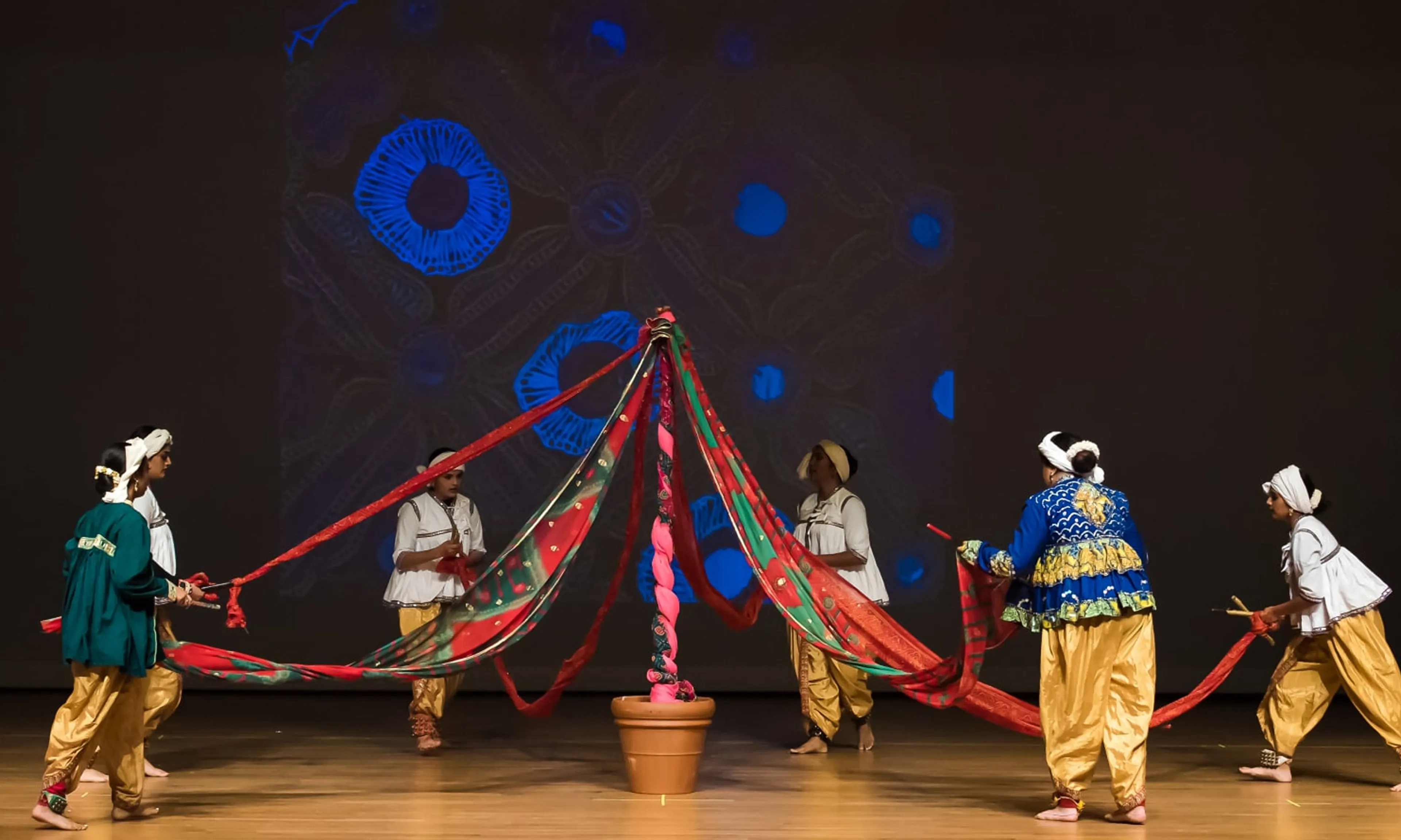 NSDA dancers performing Gof-Gunthan on stage