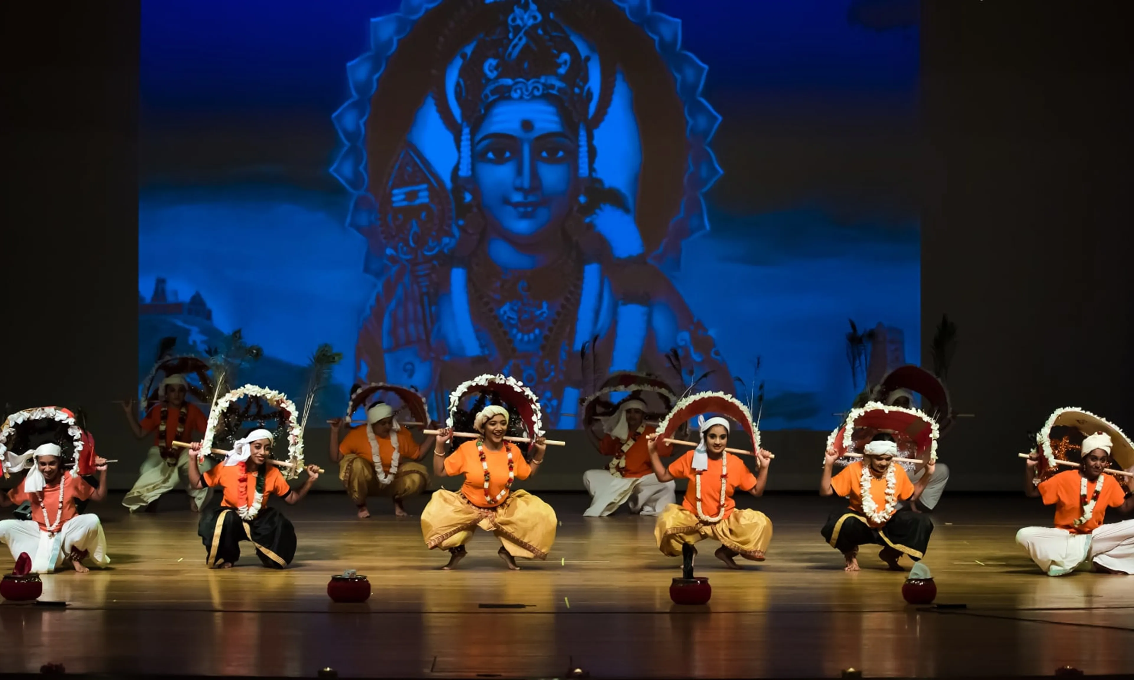 NSDA dancers performing Kavadi on stage