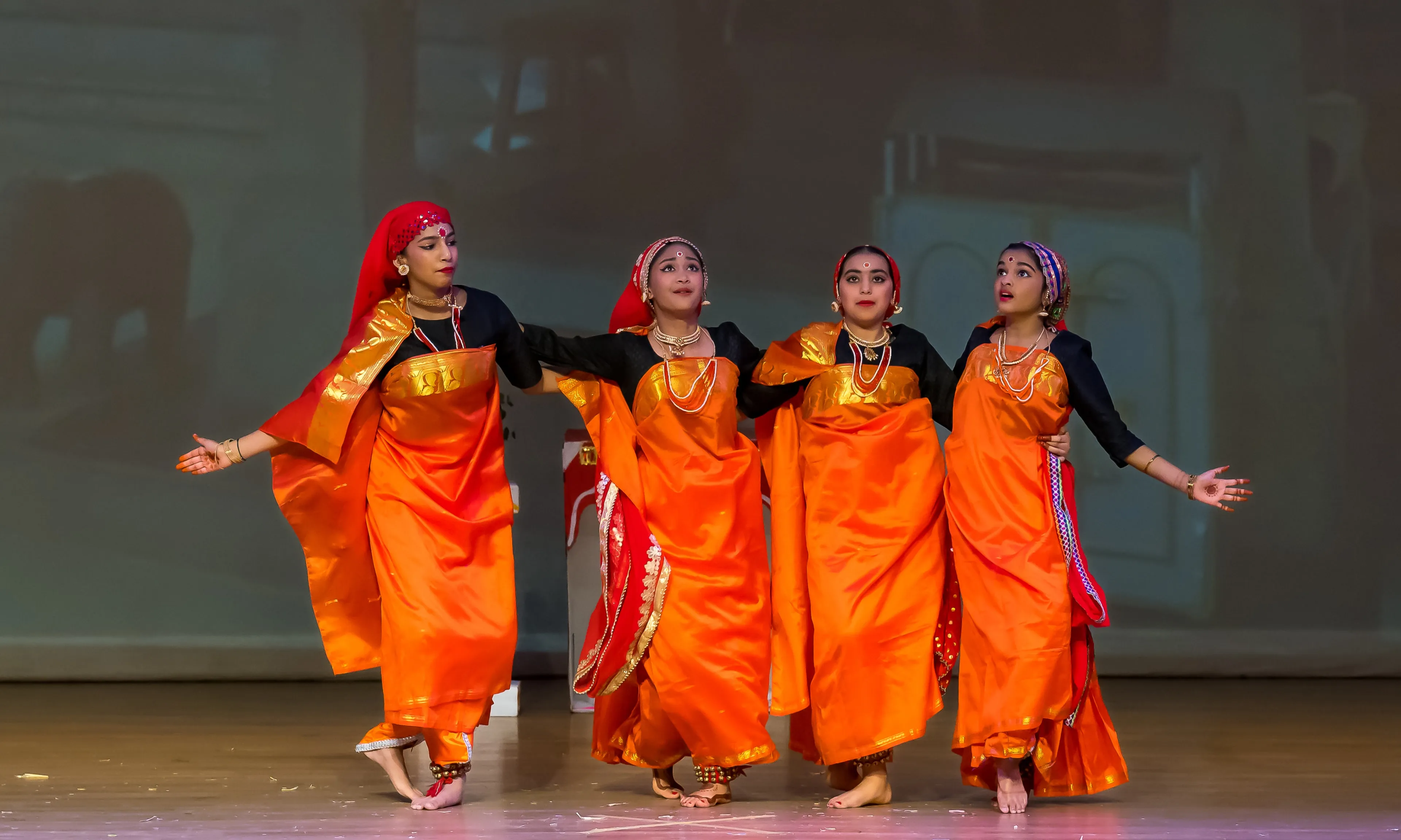 NSDA dancers performing Kodava on stage