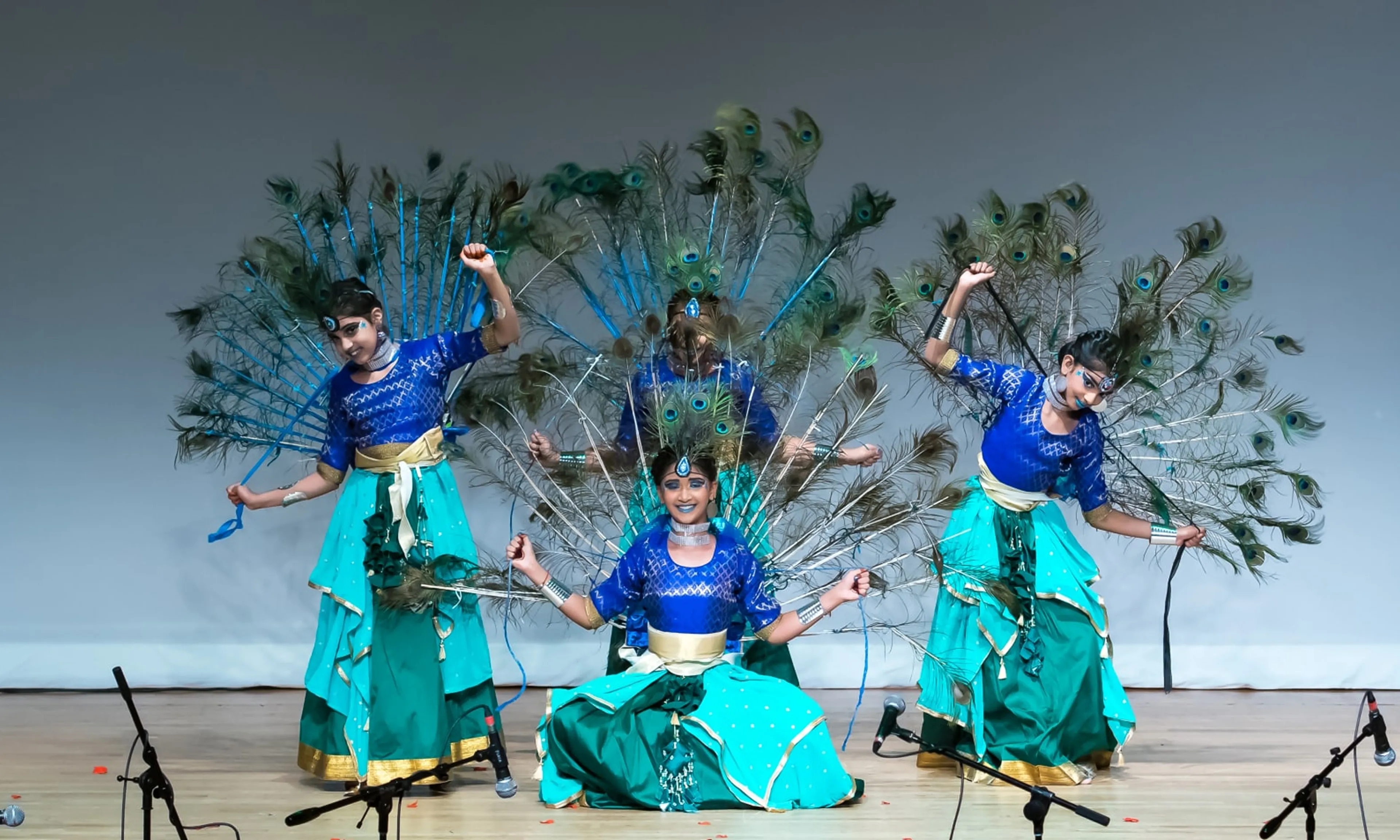 NSDA dancers performing Mayilattam on stage